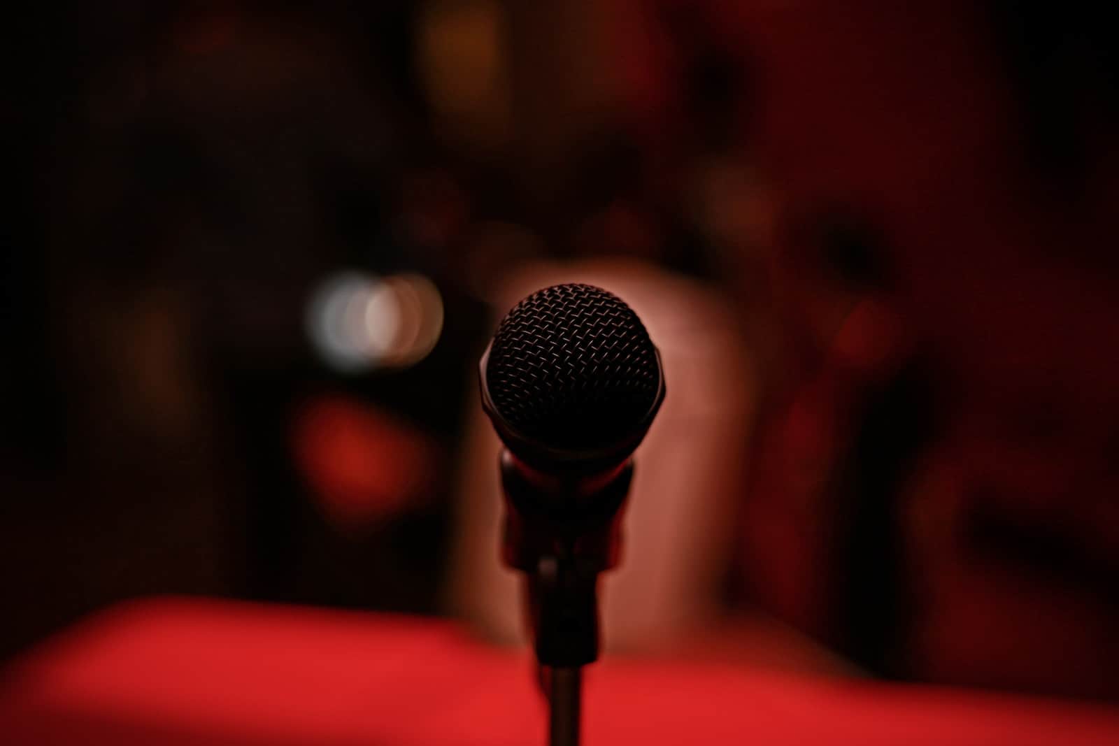 selective focus photography of black microphone